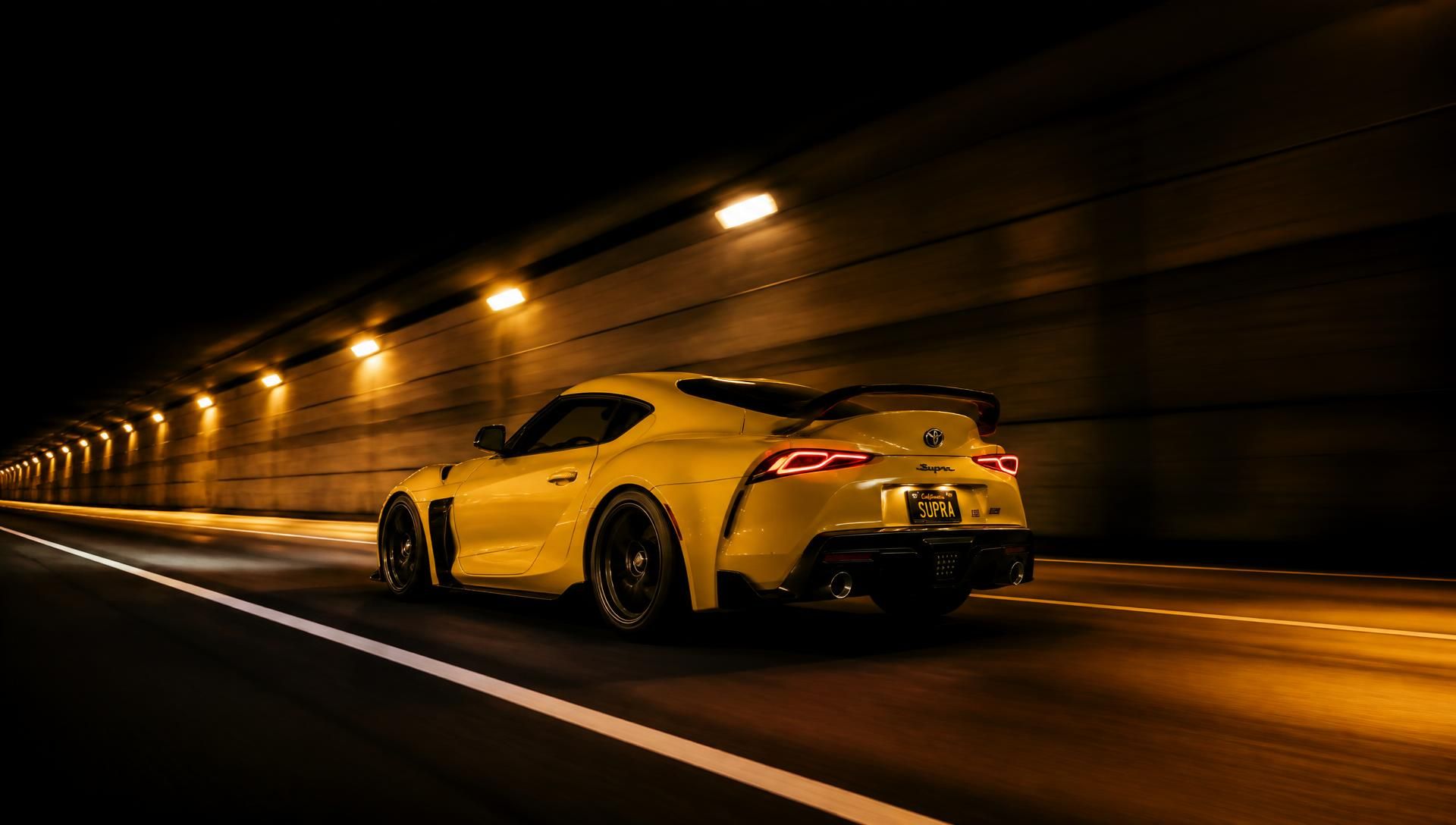 Sports car in a tunnel at night